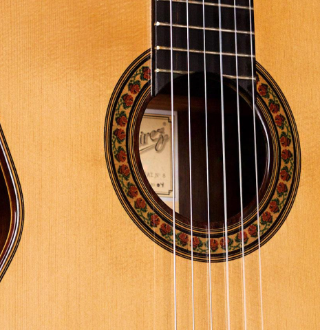 The soundboard of a 2004 Jose Ramirez "1a" classical guitar made of spruce and CSA rosewood
