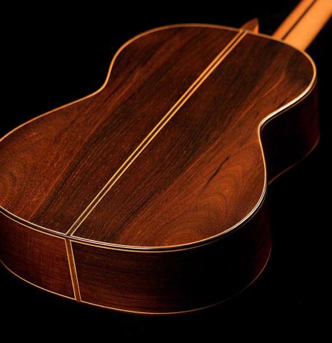 The back and sides of a 2004 Jose Ramirez "1a" classical guitar made of spruce and CSA rosewood