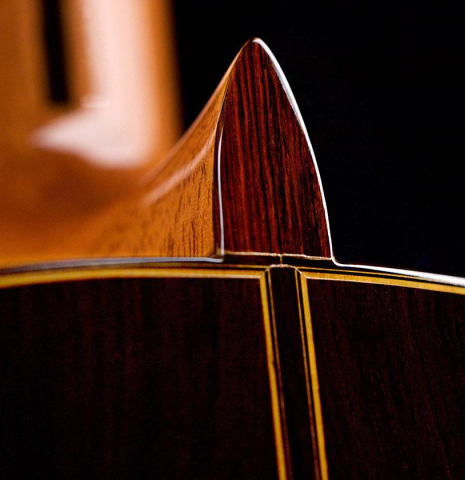 The heel, back binding and purfling of a 2004 Jose Ramirez "1a" classical guitar made of spruce and CSA rosewood