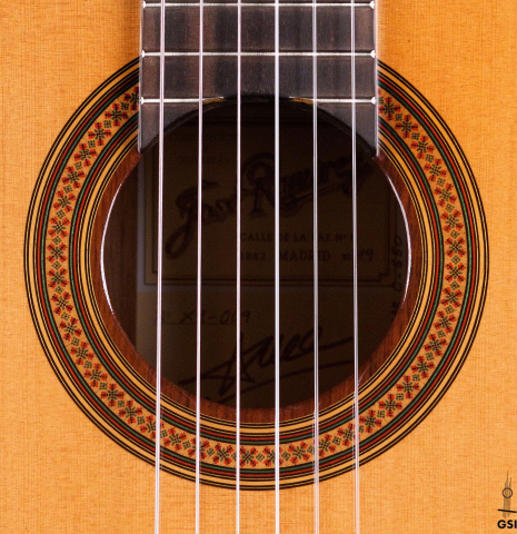 The rosette of a 2019 Jose Ramirez "1a C650" classical guitar made of cedar and African rosewood