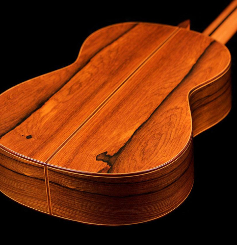 The back and sides of a 2019 Jose Ramirez "1a C650" classical guitar made of cedar and African rosewood