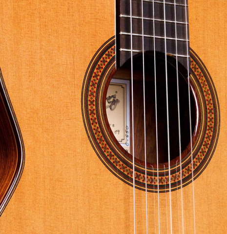 The soundboard of a 2019 Jose Ramirez "1a C650" classical guitar made of cedar and African rosewood