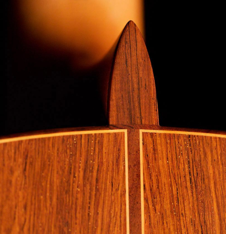 The heel, back binding and purfling of a 2019 Jose Ramirez "1a C650" classical guitar made of cedar and African rosewood