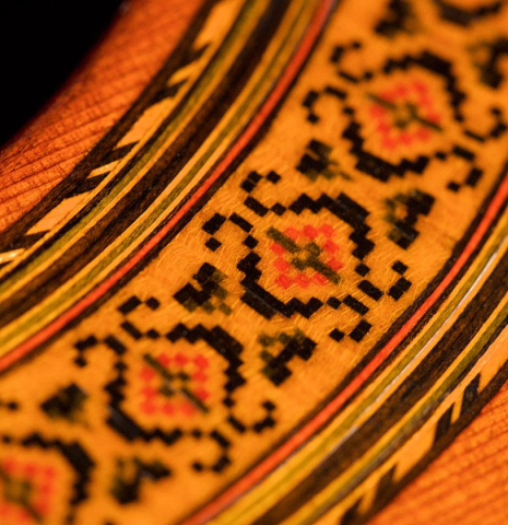 Closeup detail of the rosette of a 1971 Jose Ramirez "1a" classical guitar made of cedar and CSA rosewood