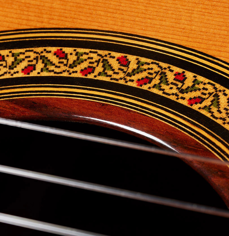 Closeup detail of the rosette of a 2001 Jose Ramirez "1a Tradicional" classical guitar made of cedar and Indian rosewood