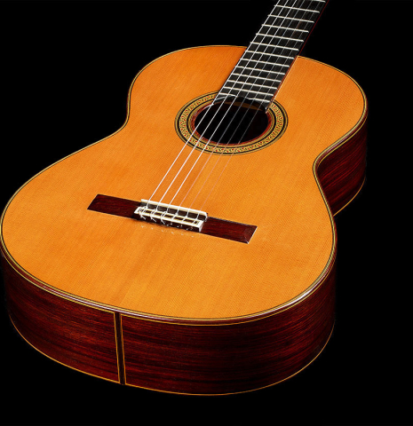 The soundboard of a 2001 Jose Ramirez "1a Tradicional" classical guitar made of cedar and Indian rosewood