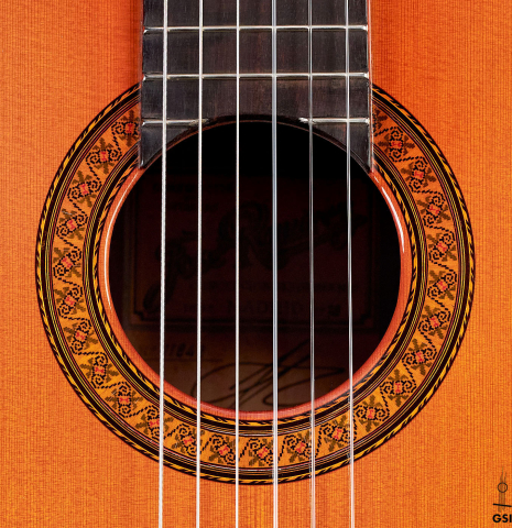 This is the rosette of a Jose Ramirez "1a" classical guitar built in 1978. It has a cedar soundboard and Indian rosewood back and sides.