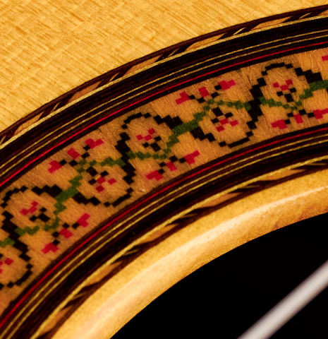 A close-up of the rosette of a 1988 Jose Ramirez &quot;1a&quot; classical guitar made of spruce and CSA rosewood