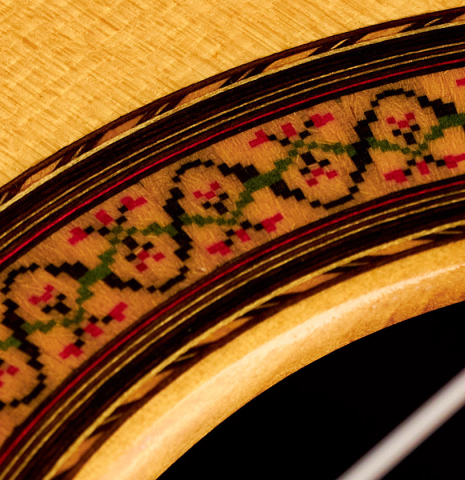 A close-up of the rosette of a 1988 Jose Ramirez "1a" classical guitar made of spruce and CSA rosewood