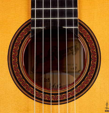 The rosette of a 2007 Jose Ramirez "1a C650-AP" classical guitar made of spruce and CSA rosewood.