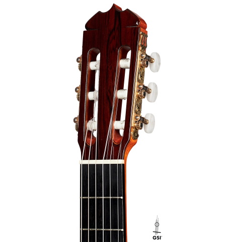 This is the head and tuners of a Jose Ramirez "1a" classical guitar built in 1976 on a white background. It has a cedar soundboard and CSA rosewood back and sides.