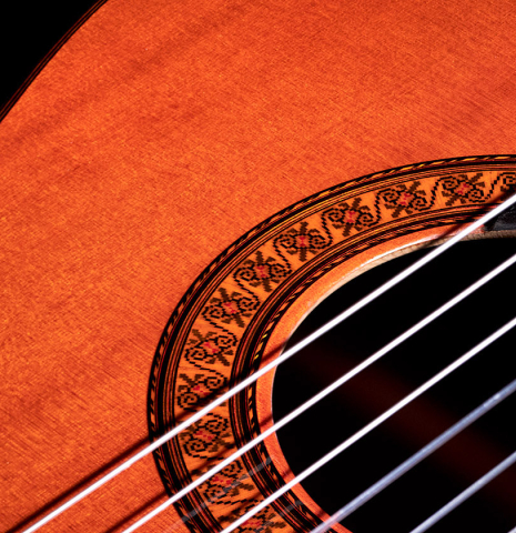 This is the top and rosette of a Jose Ramirez "1a" classical guitar built in 1976. This guitar has a cedar soundboard and CSA rosewood back and sides.
