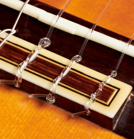 The bridge and tie block of a 1965 Jose Ramirez &quot;1a AM&quot; SP/CSAR classical guitar made by Antonio Martinez.