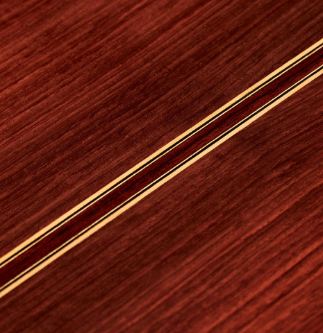 The back of a 1998 Jose Ramirez "1a Tradicional - Lefty" classical guitar made with cedar and Indian rosewood.