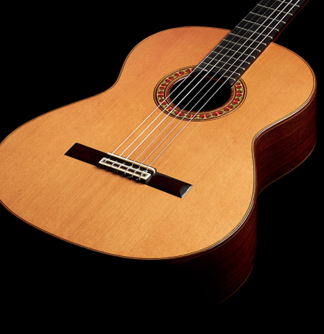 The soundboard of a 1998 Jose Ramirez "1a Tradicional - Lefty" classical guitar made with cedar and Indian rosewood.