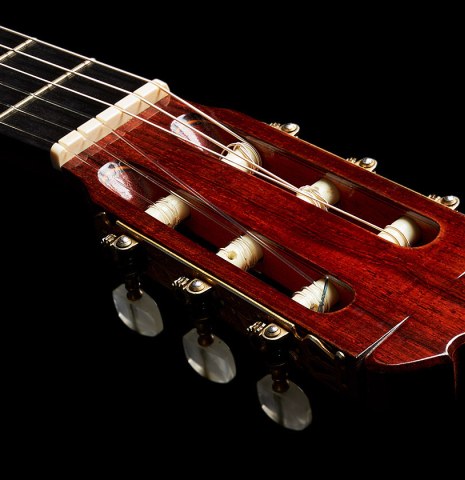 The headstock and tuning machines of a 1969 Jose Ramirez "1a AM" CD/IN classical guitar made by Antonio Martinez with cedar and Indian rosewood