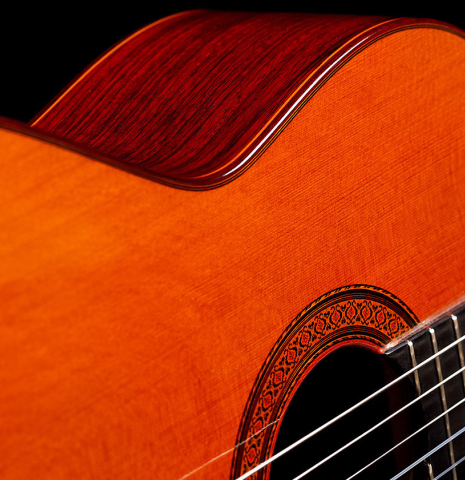 The soundboard, side and rosette of a 1977 Jose Ramirez "1a" classical guitar made with cedar and Indian rosewood.