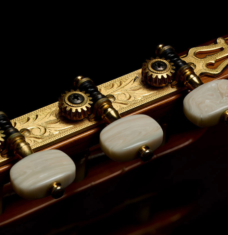The Fustero tuning machines of a 2004 Jose Ramirez "1a Tradicional" classical guitar made of spruce and Indian rosewood
