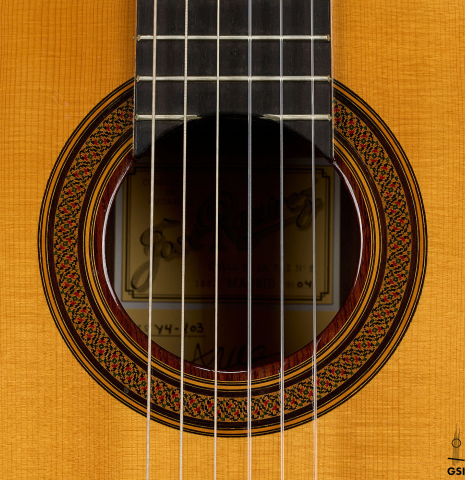 The rosette of a 2004 Jose Ramirez "1a Tradicional" classical guitar made of spruce and Indian rosewood
