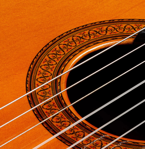 Closeup detail of the rosette of a 1973 Jose Ramirez "2a" Spanish classical guitar made with cedar top and CSA rosewood back and sides.