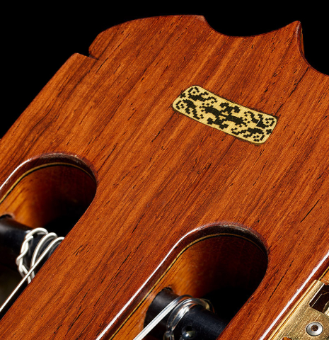 The headstock veneer of a 2013 Jose Ramirez "1a Antigua" classical guitar made of spruce and Indian rosewood