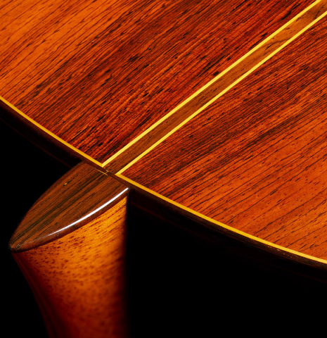 The heel, back binding and purfling of a 1992 Jose Ramirez "1a Da Camara" classical guitar made of spruce and CSA rosewood