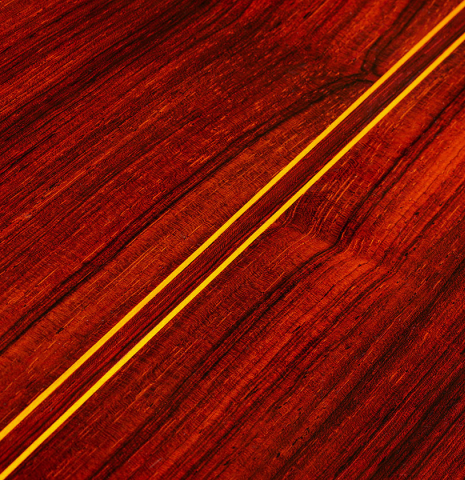 The back center seam of a 1970 Jose Ramirez "1a" classical Spanish guitar made with cedar and CSA rosewood.