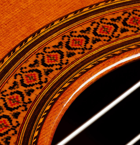Closeup detail of the rosette of a 1970 Jose Ramirez "1a" classical Spanish guitar made with cedar and CSA rosewood.