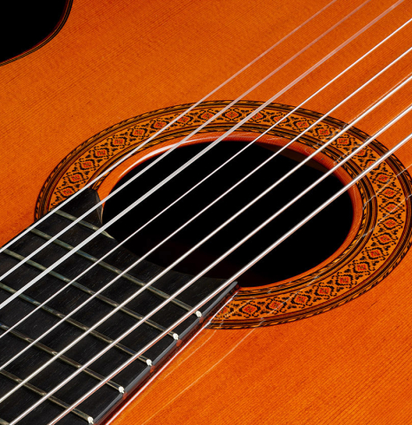 The top and rosette of a 1974 Jose Ramirez "1a 8-String" classical guitar made of cedar and CSA rosewood