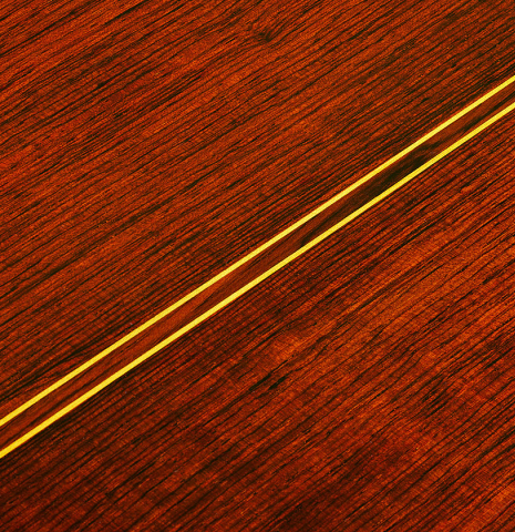 The back center seam of a 1963 Jose Ramirez "1a AM" classical guitar made of spruce and CSA rosewood by Antonio Martinez.