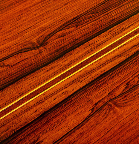 The back center seam of a 1966 Jose Ramirez "1a AM" classical guitar made of cedar and CSA rosewood by Antonio Martinez.