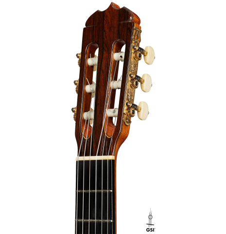 The headstock of a 2004 Jose Ramirez "1a Tradicional" classical guitar made of cedar and Indian rosewood