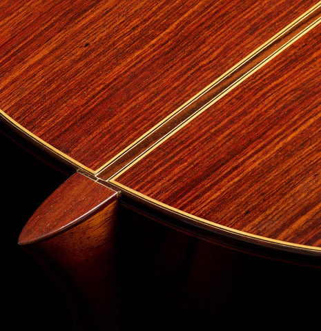 The heel, back binding and purfling of a 2004 Jose Ramirez "1a Tradicional" classical guitar made of cedar and Indian rosewood