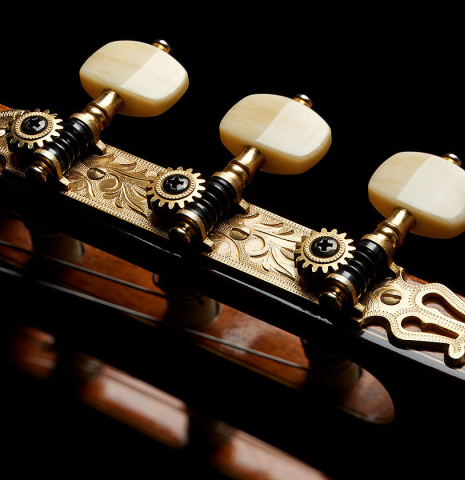 The headstock and Fustero tuning machines of a 2004 Jose Ramirez "1a Tradicional" classical guitar made of cedar and Indian rosewood