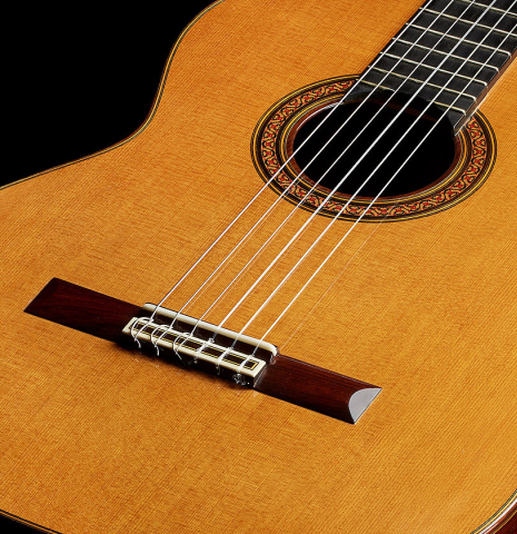 The soundboard of a 2004 Jose Ramirez "1a Tradicional" classical guitar made of cedar and Indian rosewood
