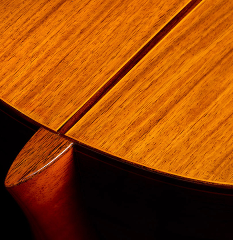 The heel, back binding and purfling of a 1985 Jose Ramirez "1a" classical guitar made of cedar and Indian rosewood