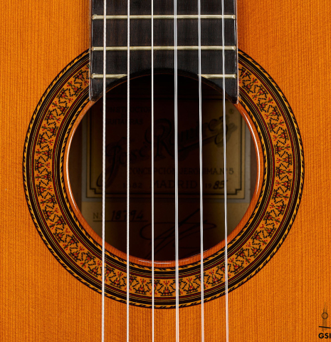 The rosette of a 1985 Jose Ramirez "1a" classical guitar made of cedar and Indian rosewood