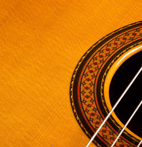The top and rosette of a 1962 Jose Ramirez "1a AM" classical guitar made of spruce and CSA rosewood
