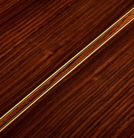 The back center seam of a 1999 Jose Ramirez "1a" classical guitar made of cedar and Indian rosewood