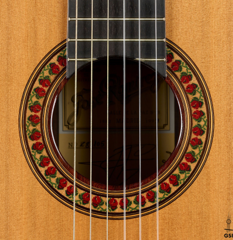 The rosette of a 1999 Jose Ramirez "1a" classical guitar made of cedar and Indian rosewood
