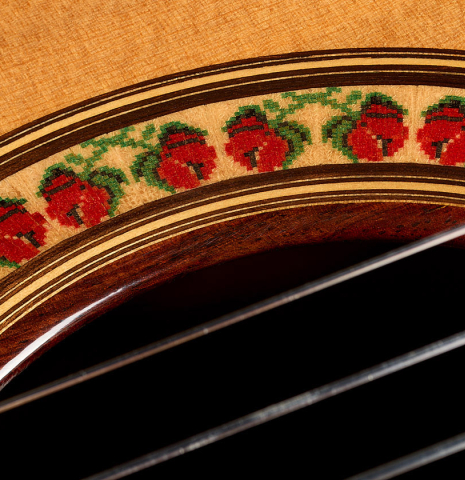 The "rose" rosette detail of a 1999 Jose Ramirez "1a" classical guitar made of cedar and Indian rosewood