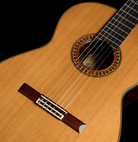 The soundboard of a 1999 Jose Ramirez "1a" classical guitar made of cedar and Indian rosewood