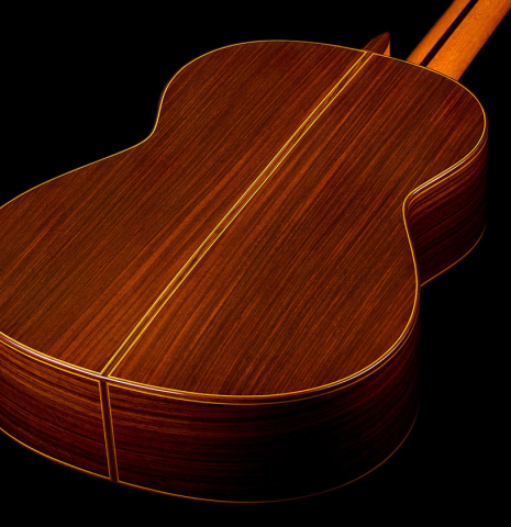 The back and sides of a 2023 Jose Ramirez "1a C650" classical guitar made of cedar and Indian rosewood