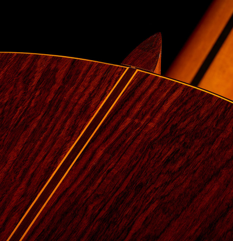 The heel, back binding and purfling of a 1979 Jose Ramirez "1a" classical guitar made of cedar and Indian rosewood