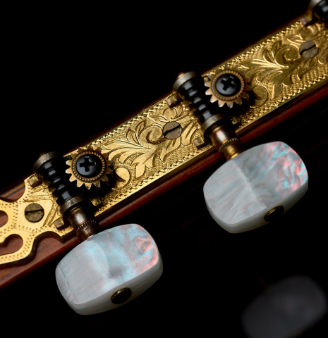 The tuning machines of a 1979 Jose Ramirez "1a" classical guitar made of cedar and Indian rosewood