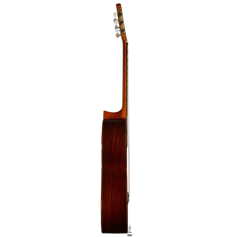 The side of a 1979 Jose Ramirez "1a" classical guitar made of cedar and Indian rosewood