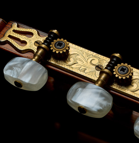 The tuning machines of a 1979 Jose Ramirez "1a" classical guitar made of cedar and Indian rosewood
