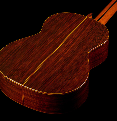 The back and sides of a 1982 Jose Ramirez "1a" classical guitar made of cedar and Indian rosewood