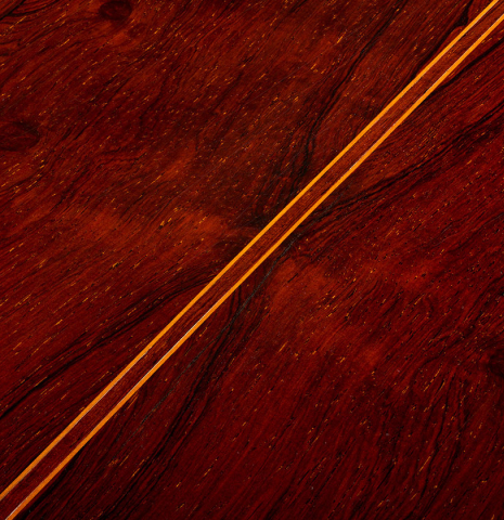 The back center seam of a 1968 Jose Ramirez "1a" classical Spanish guitar made with cedar and CSA rosewood.