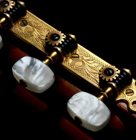 The tuning machines of a 1968 Jose Ramirez "1a" classical Spanish guitar made with cedar and CSA rosewood.